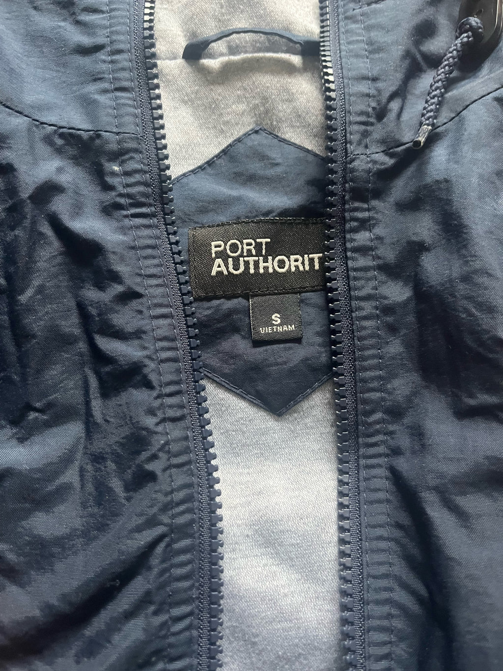 Navy windbreaker jacket